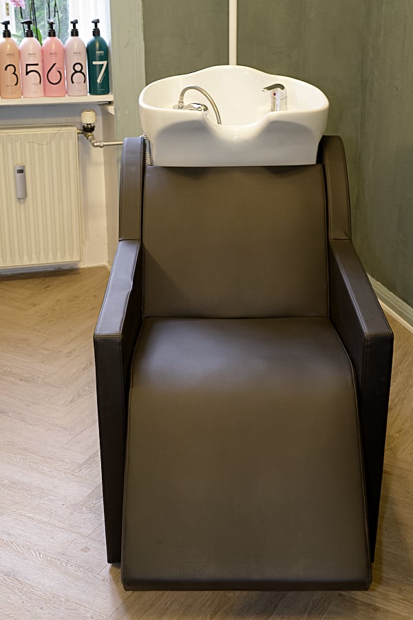 massagestol hos frisør på smallegade